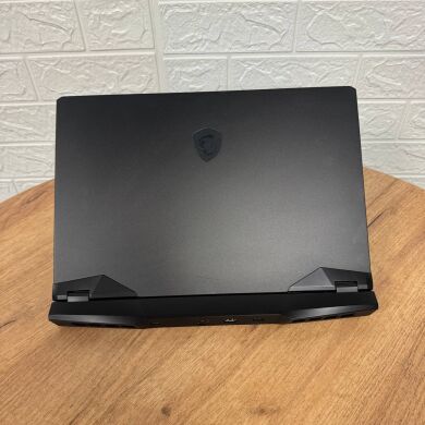 Ігровий ноутбук Б-клас MSI Vector GP66 12UHSO / 15.6" (1920x1080) IPS / Intel Core i7-12650H (10 (16) ядер по 3.5 - 4.7 GHz) / 16 GB DDR5 / 1000 GB SSD NVMe / nVidia GeForce RTX 3080 Ti, 16 GB GDDR6, 256-bit / WebCam
