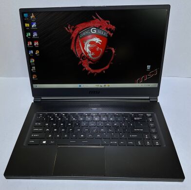 Ігровий ноутбук Б-клас MSI GS65 Stealth Thin 8RF / 15.6" (1920x1080) IPS / Intel Core i7-8750H (6 (12) ядра по 2.2 - 4.1 GHz) / 32 GB DDR4 / 512 GB SSD / nVidia GeForce GTX 1070 Max-Q, 8 GB GDDR5, 256-bit / WebCam / Win 11 Pro