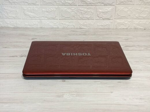 Ноутбук Toshiba Satellite L755 / 15.6" (1366x768) TN / Intel Core i3-2310M (2 (4) ядра по 2.1 GHz) / 4 GB DDR3 / 120 GB SSD / nVidia GeForce GT 525M, 1 GB DDR3, 128-bit / WebCam / DVD-ROM