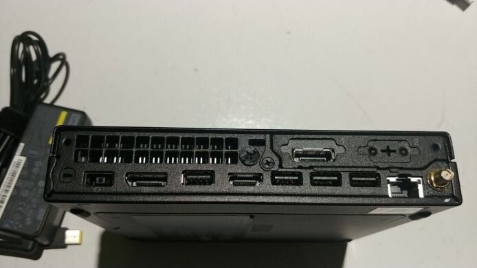 Неттоп Lenovo Thinkcentre m75q Gen2 USFF /AMD Ryzen 5 4650GE (6 (12) ядер по 3.3 - 4.2 GHz) / 16 GB DDR4 / 512 GB SSD / AMD RX Vega 7 / USB 3.1 / Wi-Fi / Блок живлення в комплекті