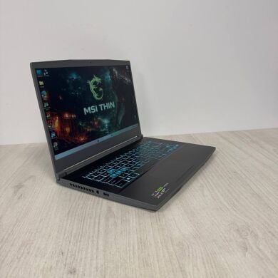 Ігровий ноутбук Б-клас MSI Thin A15 B7VE / 15.6" (1920x1080) IPS / AMD Ryzen 7 7735HS (8 (16) ядер по 3.2 - 4.75 GHz) / 16 GB DDR5 / 512 GB SSD NVMe / nVidia GeForce RTX 4050, 6 GB GDDR6, 96-bit / WebCam Ігровий ноутбук Б-клас MSI Thin A15 B7VE / 15.6" (1920x1080) IPS / AMD Ryzen 7 7735HS (8 (16) ядер по 3.2 - 4.75 GHz) / 16 GB DDR5 / 512 GB SSD NVMe / nVidia GeForce RTX 4050, 6 GB GDDR6, 96-bit / WebCam