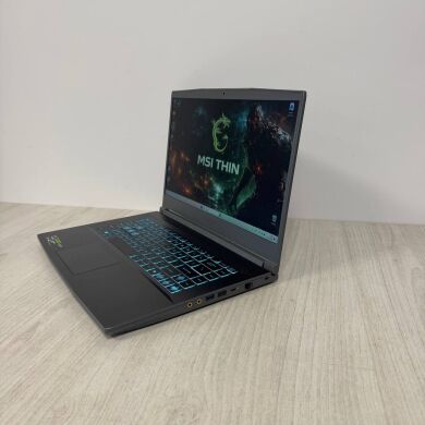Ігровий ноутбук Б-клас MSI Thin A15 B7VE / 15.6" (1920x1080) IPS / AMD Ryzen 7 7735HS (8 (16) ядер по 3.2 - 4.75 GHz) / 16 GB DDR5 / 512 GB SSD NVMe / nVidia GeForce RTX 4050, 6 GB GDDR6, 96-bit / WebCam Ігровий ноутбук Б-клас MSI Thin A15 B7VE / 15.6" (1920x1080) IPS / AMD Ryzen 7 7735HS (8 (16) ядер по 3.2 - 4.75 GHz) / 16 GB DDR5 / 512 GB SSD NVMe / nVidia GeForce RTX 4050, 6 GB GDDR6, 96-bit / WebCam