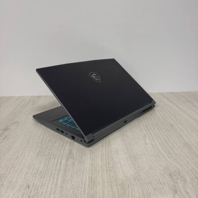 Ігровий ноутбук Б-клас MSI Thin A15 B7VE / 15.6" (1920x1080) IPS / AMD Ryzen 7 7735HS (8 (16) ядер по 3.2 - 4.75 GHz) / 16 GB DDR5 / 512 GB SSD NVMe / nVidia GeForce RTX 4050, 6 GB GDDR6, 96-bit / WebCam Ігровий ноутбук Б-клас MSI Thin A15 B7VE / 15.6" (1920x1080) IPS / AMD Ryzen 7 7735HS (8 (16) ядер по 3.2 - 4.75 GHz) / 16 GB DDR5 / 512 GB SSD NVMe / nVidia GeForce RTX 4050, 6 GB GDDR6, 96-bit / WebCam