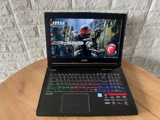 Ігровий ноутбук MSI GT62VR 6RE Dominator Pro / 15.6" (1920x1080) TN / Intel Core i7-6700HQ (4 (8) ядра по 2.6 - 3.5 GHz) / 16 GB DDR4 / 256 GB SSD + 1000 GB HDD / nVidia GeForce GTX 1070, 8 GB GDDR5, 256-bit / WebCam / HDMI Ігровий ноутбук MSI GT62VR 6RE Dominator Pro / 15.6" (1920x1080) TN / Intel Core i7-6700HQ (4 (8) ядра по 2.6 - 3.5 GHz) / 16 GB DDR4 / 256 GB SSD + 1000 GB HDD / nVidia GeForce GTX 1070, 8 GB GDDR5, 256-bit / WebCam / HDMI