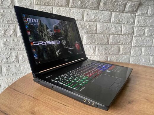 Ігровий ноутбук MSI GT62VR 6RE Dominator Pro / 15.6" (1920x1080) TN / Intel Core i7-6700HQ (4 (8) ядра по 2.6 - 3.5 GHz) / 16 GB DDR4 / 256 GB SSD + 1000 GB HDD / nVidia GeForce GTX 1070, 8 GB GDDR5, 256-bit / WebCam / HDMI Ігровий ноутбук MSI GT62VR 6RE Dominator Pro / 15.6" (1920x1080) TN / Intel Core i7-6700HQ (4 (8) ядра по 2.6 - 3.5 GHz) / 16 GB DDR4 / 256 GB SSD + 1000 GB HDD / nVidia GeForce GTX 1070, 8 GB GDDR5, 256-bit / WebCam / HDMI