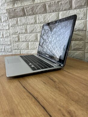 Ігровий ноутбук Asus VivoBook Flip R518UQ / 15.6" (1920x1080) IPS Touch / Intel Core i7-7500U (2 (4) ядра по 2.7 - 3.5 GHz) / 12 GB DDR4 / 128 GB SSD M.2 / nVidia GeForce 940MX, 2 GB GDDR5, 64-bit / WebCam