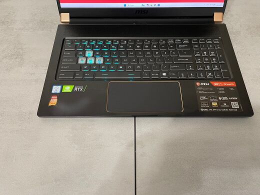 Ігровий ноутбук MSI GS75 Stealth 9SF-243US / 17.3" (1920x1080) IPS / Intel Core i7-9750H (6 (12) ядер по 2.6 - 4.5 GHz) / 16 GB DDR4 / 1000 GB SSD M.2 / nVidia GeForce RTX 2070, 8 GB GDDR6, 256-bit / WebCam Ігровий ноутбук MSI GS75 Stealth 9SF-243US / 17.3" (1920x1080) IPS / Intel Core i7-9750H (6 (12) ядер по 2.6 - 4.5 GHz) / 16 GB DDR4 / 1000 GB SSD M.2 / nVidia GeForce RTX 2070, 8 GB GDDR6, 256-bit / WebCam