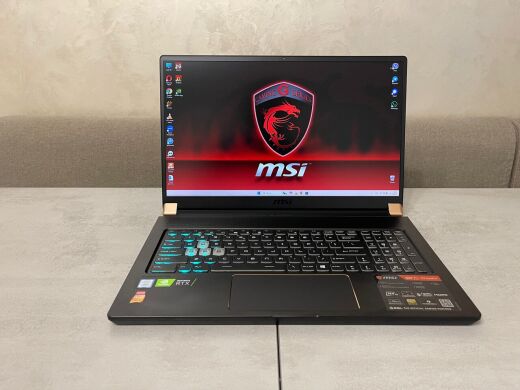 Ігровий ноутбук MSI GS75 Stealth 9SF-243US / 17.3" (1920x1080) IPS / Intel Core i7-9750H (6 (12) ядер по 2.6 - 4.5 GHz) / 16 GB DDR4 / 1000 GB SSD M.2 / nVidia GeForce RTX 2070, 8 GB GDDR6, 256-bit / WebCam Ігровий ноутбук MSI GS75 Stealth 9SF-243US / 17.3" (1920x1080) IPS / Intel Core i7-9750H (6 (12) ядер по 2.6 - 4.5 GHz) / 16 GB DDR4 / 1000 GB SSD M.2 / nVidia GeForce RTX 2070, 8 GB GDDR6, 256-bit / WebCam
