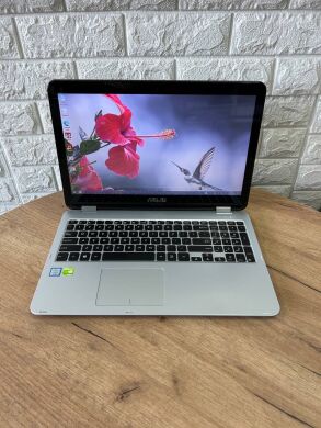 Ігровий ноутбук Asus VivoBook Flip R518UQ / 15.6" (1920x1080) IPS Touch / Intel Core i7-7500U (2 (4) ядра по 2.7 - 3.5 GHz) / 12 GB DDR4 / 128 GB SSD M.2 / nVidia GeForce 940MX, 2 GB GDDR5, 64-bit / WebCam