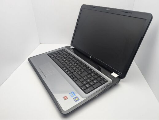 Ноутбук HP Pavillion g7-1206ss / 17.3" (1600x900) TN / Intel Core i5-2430M (2 (4) ядра по 2.4 - 3.0 GHz) / 6 GB DDR3 / 750 GB HDD / AMD Radeon HD 6470M, 1 GB GDDR3, 64-bit / WebCam / DVD-ROM
