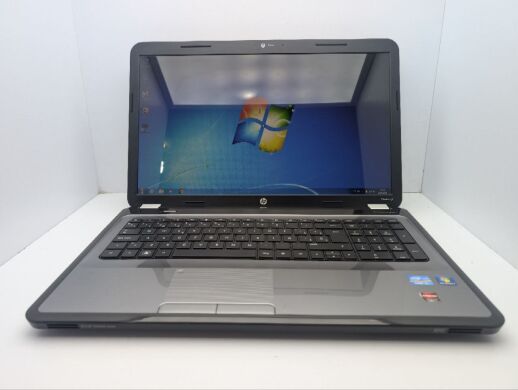 Ноутбук HP Pavillion g7-1206ss / 17.3" (1600x900) TN / Intel Core i5-2430M (2 (4) ядра по 2.4 - 3.0 GHz) / 6 GB DDR3 / 750 GB HDD / AMD Radeon HD 6470M, 1 GB GDDR3, 64-bit / WebCam / DVD-ROM