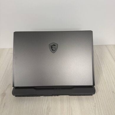 Игровой ноутбук Б-класс MSI Vector GP68HX 12VH / 16" (1920x1200) IPS / Intel Core i9-12900HX (16 (24) ядер по 3.6 - 5.0 GHz) / 32 GB DDR5 / 1000 GB SSD NVMe / nVidia GeForce RTX 4080, 12 GB GDDR6, 192-bit / WebCam