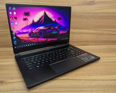 Ігровий ноутбук Б-клас MSI GS65 Stealth 9SE / 15.6" (1920x1080) IPS / Intel Core i7-9750H (6 (12) ядер по 2.6 - 4.5 GHz) / 16 GB DDR4 / 512 GB SSD / nVidia GeForce RTX 2060, 6 GB GDDR6, 192-bit / WebCam / Windows 10