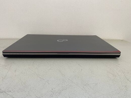 Мобільна робоча станція Fujitsu Celsius H730 / 15.6" (1920x1080) IPS / Intel Core i7-4800MQ (4 (8) ядра по 2.7 - 3.7 GHz) / 32 GB DDR3 / 256 GB SSD / nVidia Quadro K1100M, 2 GB GDDR5, 128-bit / WebCam / DVD-ROM