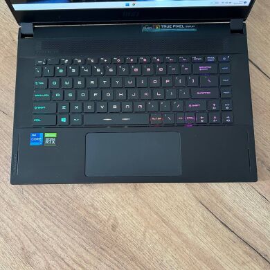 Игровой ноутбук Б-класс MSI Creator 15 A11UE / 15.6" (3840x2160) OLED / Intel Core i7-11800H (8 (16) ядер по 2.3 - 4.6 GHz) / 16 GB DDR4 / 1000 GB SSD / nVidia GeForce RTX 3060, 6 GB GDDR6, 192-bit / WebCam