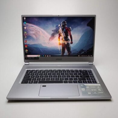 Ігровий ноутбук MSI P65 Creator 9SF-654US / 15.6" (3840x2160) IPS / Intel Core i9-9880H (8 (16) ядер по 2.3 - 4.8 GHz) / 32 GB DDR4 / 1000 GB SSD / nVidia GeForce RTX 2070 Max-Q, 8 GB GDDR6, 256-bit / WebCam / Win 10 Pro
