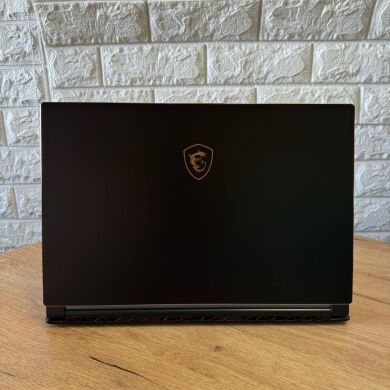 Ігровий ноутбук MSI GS65 8RF Stealth Thin / 15.6" (1920x1080) IPS / Intel Core i7-8750H (6 (12) ядра по 2.2 - 4.1 GHz) / 16 GB DDR4 / 512 GB SSD M.2 / nVidia GeForce GTX 1070 Max-Q, 8 GB GDDR5, 256-bit / WebCam