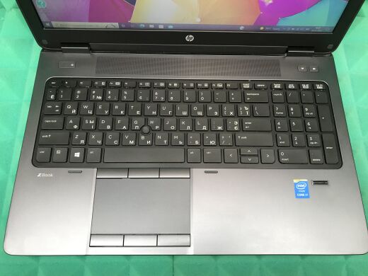 Мобільна робоча станція HP ZBook 15 G2 / 15.6" (1920x1080) TN / Intel Core i7-4700MQ (4 (8) ядра по 2.4 - 3.4 GHz) / 8 GB DDR3 / 180 GB SSD / nVidia Quadro K1100M, 2 GB GDDR5, 128-bit / WebCam / DVD-RW / Windows 10 ліцензія
