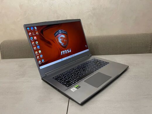 Мобильная рабочая станция MSI GF63 MS-16R4 / 15.6" (1920x1080) IPS / Intel Core i7-10750H (6 (12) ядер по 2.6 - 5.0 GHz) / 16 GB DDR4 / 512 GB SSD M.2 / nVidia Quadro T1000, 4 GB GDDR6, 128-bit / WebCam / HDMI