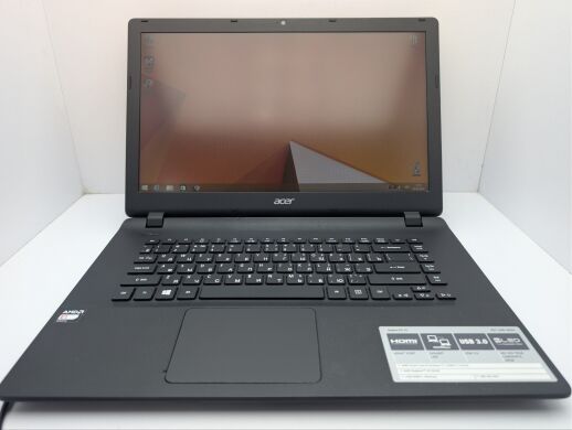 Ноутбук Acer Aspire ES1-520 / 15.6" (1366x768) TN / AMD E1-1500 (2 ядра по 1.4 GHz) / 8 GB DDR3 / 320 GB HDD / AMD Radeon HD 7310 Graphics / WebCam / АКБ не тримає Ноутбук Acer Aspire ES1-520 / 15.6" (1366x768) TN / AMD E1-1500 (2 ядра по 1.4 GHz) / 8 GB DDR3 / 320 GB HDD / AMD Radeon HD 7310 Graphics / WebCam / АКБ не тримає