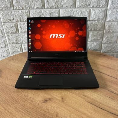 Игровой ноутбук MSI GF63 Thin 10UD / 15.6" (1920x1080) IPS / Intel Core i5-10500H (6 (12) ядер по 2.5 - 4.5 GHz) / 8 GB DDR4 / 512 GB SSD / nVidia GeForce RTX 3050 Ti, 4 GB GDDR6, 128-bit / WebCam Игровой ноутбук MSI GF63 Thin 10UD / 15.6" (1920x1080) IPS / Intel Core i5-10500H (6 (12) ядер по 2.5 - 4.5 GHz) / 8 GB DDR4 / 512 GB SSD / nVidia GeForce RTX 3050 Ti, 4 GB GDDR6, 128-bit / WebCam