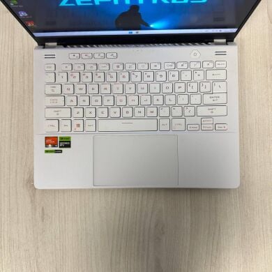 Игровой ультрабук Asus ROG Zephyrus G14 GA402XY / 14" (2560x1600) IPS / AMD Ryzen 9 7940HS (8 (16) ядер по 4.0 - 5.2 GHz) / 32 GB DDR5 / 1000 GB SSD NVMe / nVidia GeForce RTX 4090, 16 GB GDDR6, 256-bit / WebCam