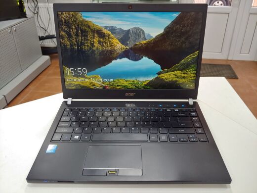 Ноутбук Acer TravelMate P645 / 14" (1920x1080) IPS LED / Intel Core i7-4500U (2 (4) ядра по 1.8 - 3.0 GHz) / 8 GB DDR3 / 240 GB SSD / WebCam / USB 3.0 / HDMI