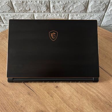 Ігровий ноутбук Б-клас MSI GS65 8RF Stealth Thin / 15.6" (1920x1080) IPS / Intel Core i7-8750H (6 (12) ядра по 2.2 - 4.1 GHz) / 16 GB DDR4 / 512 GB SSD / nVidia GeForce GTX 1070 Max-Q, 8 GB GDDR5, 256-bit / WebCam