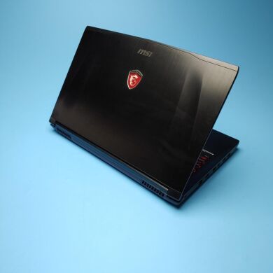 Ігровий ноутбук MSI GE62 2QF Apache Pro / 15.6" (1920x1080) IPS / Intel Core i7-5700HQ (4 (8) ядра по 2.7 - 3.5 GHz) / 16 GB DDR3 / 128 GB SSD + 1000 GB HDD / nVidia GeForce GTX 970M, 3 GB GDDR5, 192-bit / WebCam / DVD-ROM / Win 10 Home