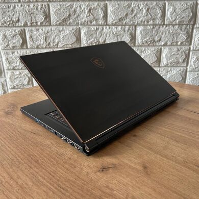 Ігровий ноутбук Б-клас MSI GS65 8RF Stealth Thin / 15.6" (1920x1080) IPS / Intel Core i7-8750H (6 (12) ядра по 2.2 - 4.1 GHz) / 16 GB DDR4 / 512 GB SSD / nVidia GeForce GTX 1070 Max-Q, 8 GB GDDR5, 256-bit / WebCam