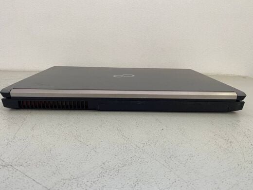 Мобильная рабочая станция Fujitsu Celsius H730 / 15.6" (1920x1080) IPS / Intel Core i7-4800MQ (4 (8) ядра по 2.7 - 3.7 GHz) / 16 GB DDR3 / 128 GB SSD / nVidia Quadro K1100M, 2 GB GDDR5, 128-bit / WebCam / DVD-ROM