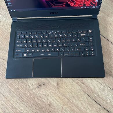 Ігровий ноутбук Б-клас MSI GS65 8RF Stealth Thin / 15.6" (1920x1080) IPS / Intel Core i7-8750H (6 (12) ядра по 2.2 - 4.1 GHz) / 16 GB DDR4 / 512 GB SSD / nVidia GeForce GTX 1070 Max-Q, 8 GB GDDR5, 256-bit / WebCam