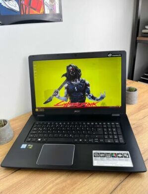 Ігровий ноутбук Acer Aspire E5-774G-59BD / 17.3" (1920x1080) IPS / Intel Core i5-7200U (2 (4) ядра по 2.5 - 3.1 GHz) / 12 GB DDR4 / 128 GB SSD + 1000 GB HDD / nVidia GeForce GTX 950M, 2 GB GDDR5, 128-bit / WebCam / DVD-RW / Win 10