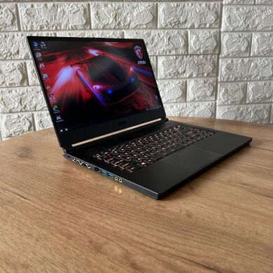 Ігровий ноутбук Б-клас MSI GS65 8RF Stealth Thin / 15.6" (1920x1080) IPS / Intel Core i7-8750H (6 (12) ядра по 2.2 - 4.1 GHz) / 16 GB DDR4 / 512 GB SSD / nVidia GeForce GTX 1070 Max-Q, 8 GB GDDR5, 256-bit / WebCam