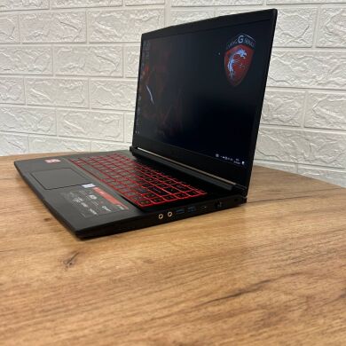 Игровой ноутбук MSI GF63 Thin 8RC / 15.6" (1920x1080) IPS / Intel Core i7-8750H (6 (12) ядер по 2.2 - 4.1 GHz) / 8 GB DDR4 / 128 GB SSD + 1000 GB HDD / nVidia GeForce GTX 1050, 4 GB GDDR5, 128-bit / WebCam