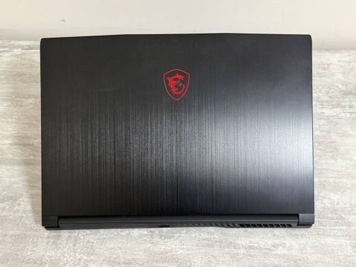 Игровой ноутбук MSI GF63 Thin 11UC / 15.6" (1920x1080) IPS / Intel Core i5-11400H (6 (12) ядер по 2.7 - 4.5 GHz) / 16 GB DDR4 / 512 GB SSD / nVidia GeForce RTX 3050, 4 GB GDDR6, 128-bit / WebCam / Win 11 Home