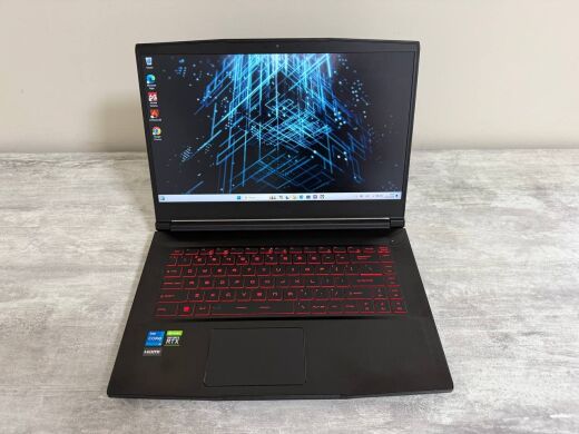 Игровой ноутбук MSI GF63 Thin 11UC / 15.6" (1920x1080) IPS / Intel Core i5-11400H (6 (12) ядер по 2.7 - 4.5 GHz) / 16 GB DDR4 / 512 GB SSD / nVidia GeForce RTX 3050, 4 GB GDDR6, 128-bit / WebCam / Win 11 Home
