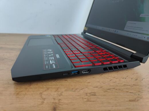 Ігровий ноутбук Б-клас Acer Nitro AN515-57-79TF / 15.6" (1920x1080) IPS / Intel Core i7-11800H (8 (16) ядер по 2.3 - 4.6 GHz) / 16 GB DDR4 / 512 GB SSD / nVidia GeForce RTX 3050 Ti, 4 GB GDDR6, 128-bit / WebCam / Windows 11 Ігровий ноутбук Б-клас Acer Nitro AN515-57-79TF / 15.6" (1920x1080) IPS / Intel Core i7-11800H (8 (16) ядер по 2.3 - 4.6 GHz) / 16 GB DDR4 / 512 GB SSD / nVidia GeForce RTX 3050 Ti, 4 GB GDDR6, 128-bit / WebCam / Windows 11