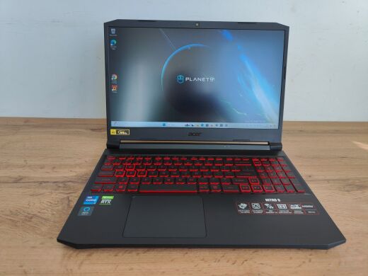 Ігровий ноутбук Б-клас Acer Nitro AN515-57-79TF / 15.6" (1920x1080) IPS / Intel Core i7-11800H (8 (16) ядер по 2.3 - 4.6 GHz) / 16 GB DDR4 / 512 GB SSD / nVidia GeForce RTX 3050 Ti, 4 GB GDDR6, 128-bit / WebCam / Windows 11 Ігровий ноутбук Б-клас Acer Nitro AN515-57-79TF / 15.6" (1920x1080) IPS / Intel Core i7-11800H (8 (16) ядер по 2.3 - 4.6 GHz) / 16 GB DDR4 / 512 GB SSD / nVidia GeForce RTX 3050 Ti, 4 GB GDDR6, 128-bit / WebCam / Windows 11