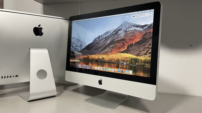 Моноблок Apple iMac A1311 / 21.5" (1920x1080) IPS / Intel Core i3-540 (2 (4) ядра по  3.06 GHz) / 4 GB DDR3 / 500 GB HDD / AMD Radeon HD 4670, 256 MB GDDR3, 128-bit / DVD-ROM / WiFi / Mac OS
