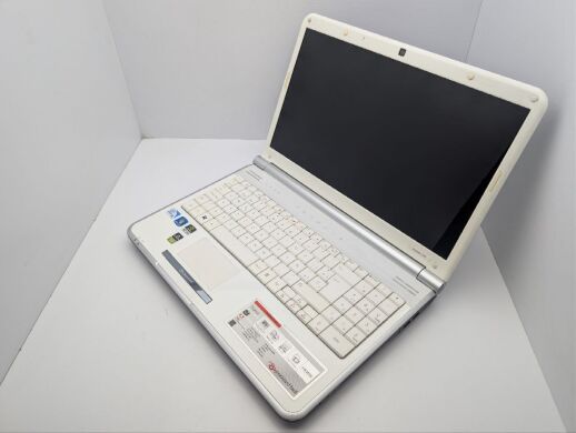 Ноутбук Packard Bell TJ66 / 15.6" (1366x768) TN / Intel Pentium T4300 (2 ядра по 2.1 GHz) / 4 GB DDR2 / 320 GB HDD / nVidia GeForce G210M, 512 MB GDDR3, 64-bit / WebCam / DVD-ROM
