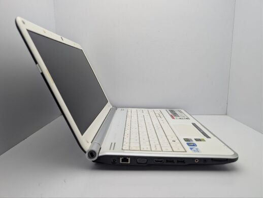 Ноутбук Packard Bell TJ66 / 15.6" (1366x768) TN / Intel Pentium T4300 (2 ядра по 2.1 GHz) / 4 GB DDR2 / 320 GB HDD / nVidia GeForce G210M, 512 MB GDDR3, 64-bit / WebCam / DVD-ROM