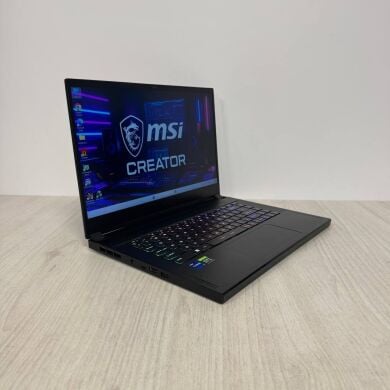 Игровой ноутбук Б-класс MSI Creator 15 A11UH / 15.6" (1920x1080) IPS / Intel Core i7-11800H (8 (16) ядер по 1.9 - 4.6 GHz) / 16 GB DDR4 / 512 GB SSD / nVidia GeForce RTX 3080, 8 GB GDDR6, 256-bit / WebCam