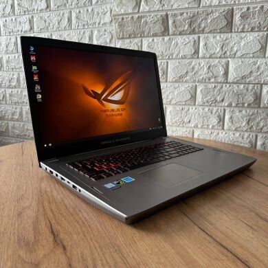 Ігровий ноутбук Asus ROG Strix GL702VS / 17.3" (1920x1080) IPS / Intel Core i7-7700HQ (4 (8) ядра по 2.8 - 3.8 GHz) / 12 GB DDR4 / 256 GB SSD M.2 + 1000 GB HDD / nVidia GeForce GTX 1070, 8 GB GDDR5, 256-bit / WebCam Ігровий ноутбук Asus ROG Strix GL702VS / 17.3" (1920x1080) IPS / Intel Core i7-7700HQ (4 (8) ядра по 2.8 - 3.8 GHz) / 12 GB DDR4 / 256 GB SSD M.2 + 1000 GB HDD / nVidia GeForce GTX 1070, 8 GB GDDR5, 256-bit / WebCam