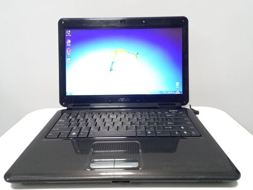 Ноутбук Asus K40IJ / 14" (1366x768) TN / Intel Pentium T4400 (2 ядра по 2.2 GHz) / 4 GB DDR2 / 300 GB HDD / Intel GMA X4500 Graphics / WebCam / АКБ не держит Ноутбук Asus K40IJ / 14" (1366x768) TN / Intel Pentium T4400 (2 ядра по 2.2 GHz) / 4 GB DDR2 / 300 GB HDD / Intel GMA X4500 Graphics / WebCam / АКБ не держит