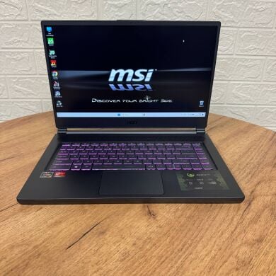 Игровой ноутбук Б-класс MSI Delta 15 A5EFK / 15.6" (1920x1080) IPS / AMD Ryzen 7 5800H (8 (16) ядер по 3.2 - 4.4 GHz) / 16 GB DDR4 / 512 GB SSD / AMD Radeon RX 6700M, 10 GB GDDR6, 160-bit / WebCam