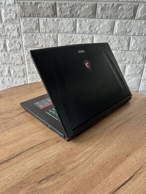 Игровой ноутбук MSI GE72VR 6RF Apache Pro / 17.3" (1920x1080) IPS / Intel Core i7-6700HQ (4 (8) ядра по 2.6 - 3.5 GHz) / 16 GB DDR4 / 128 GB SSD + 1000 GB HDD / nVidia GeForce GTX 1060, 6 GB GDDR5, 192-bit / WebCam