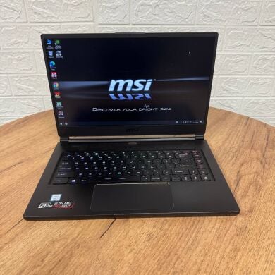Игровой ноутбук Б-класс MSI GS65 Stealth 9SG / 15.6" (1920x1080) IPS / Intel Core i7-9750H (6 (12) ядра по 2.6&nbsp;- 4.5&nbsp;GHz) / 16 GB DDR4 / 512 GB SSD / nVidia GeForce RTX 2080 Max-Q, 8 GB GDDR6, 256-bit / WebCam