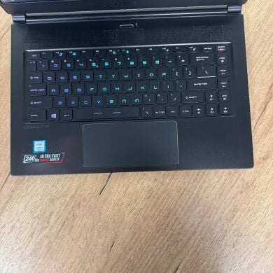 Игровой ноутбук Б-класс MSI GS65 Stealth 9SG / 15.6" (1920x1080) IPS / Intel Core i7-9750H (6 (12) ядра по 2.6&nbsp;- 4.5&nbsp;GHz) / 16 GB DDR4 / 512 GB SSD / nVidia GeForce RTX 2080 Max-Q, 8 GB GDDR6, 256-bit / WebCam