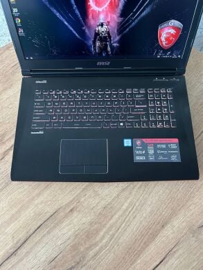 Игровой ноутбук MSI GE72VR 6RF Apache Pro / 17.3" (1920x1080) IPS / Intel Core i7-6700HQ (4 (8) ядра по 2.6 - 3.5 GHz) / 16 GB DDR4 / 128 GB SSD + 1000 GB HDD / nVidia GeForce GTX 1060, 6 GB GDDR5, 192-bit / WebCam